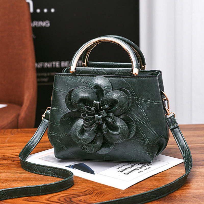 Black faux leather handbag